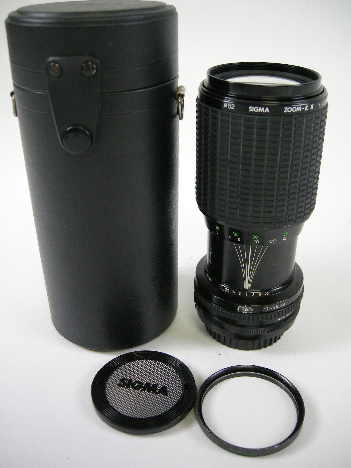 Sigma 70-210mm f4.5 Zoom K II MC Konica Mt. lens with caps, filter and case.