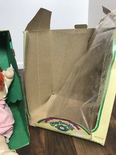 vintage Cabbage Patch Kid with damaged box --1985 red hair w/piggy tails