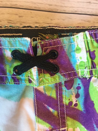 Childens Place XS lined Boys Swimsuit With Skull.  Green, Blue, Purple, White