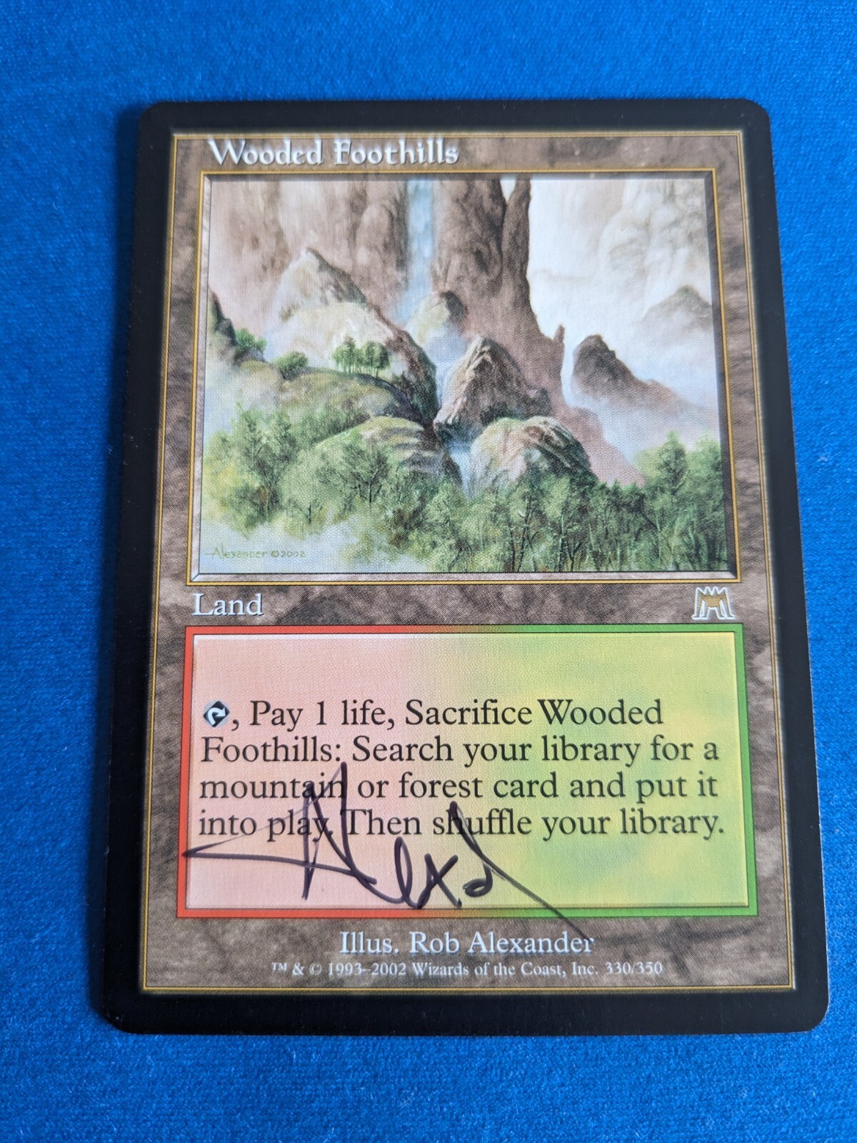 樹木茂る山麓 Wooded Foothills 英語版1枚　オンスロート ONS Wooded Foothills · Onslaught (ONS) #330 · Scryfall Magic The