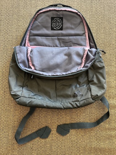 the brand with the three stripes bag