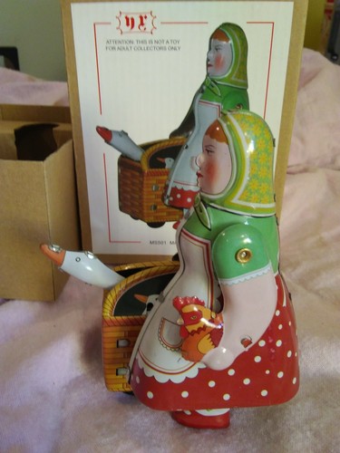 NRFB Reproduction Tin Toy Woman With Goose And Rooster