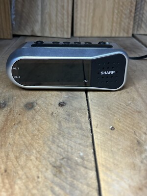 Sharp Digital Small Alarm Clock LED Display Battery Backup Snooze Model SPC100