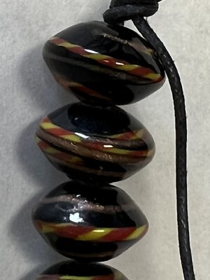 FANCY GLASS BEADS 12x10mm black With Red, gold And Yellow Rondel 24 Total Beads