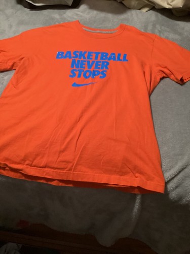 vintage Nike T Shirt “ BASKETBALL NEVER STOPS “orange | eBay