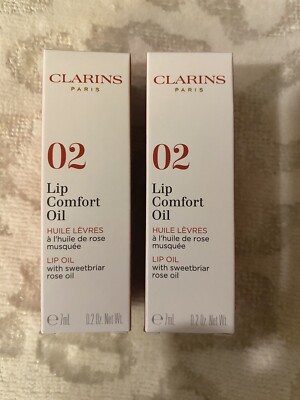 2-PACK Clarins Lip Comfort Oil  /02 Raspberry/0.2oz Each/With Rose Oil.