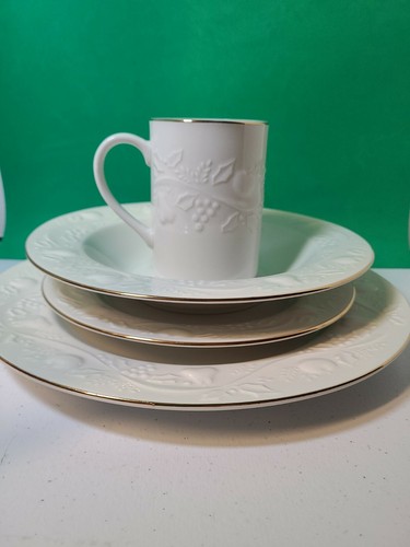 Libbey - Gold Rimmed, Cream Fruit & Holly Embossed  4 Piece Place Setting for 4