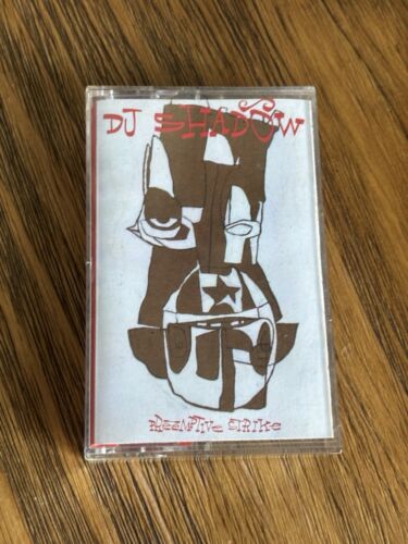 DJ Shadow Preemptive Strike NM- 1998 Mo Wax USA Cassette DJ Shadow Preemptive Strike NM- 1998 Mo Wax USA Cassette