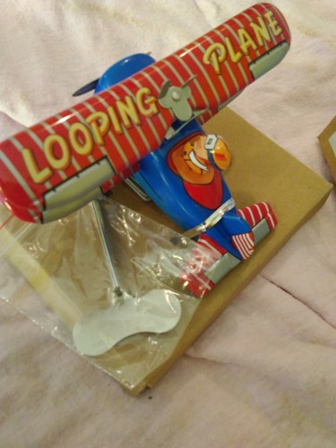 NRFB Tin Toy Reproduction Looping Plane Airplane With Pilot made by Ha Ha Toy