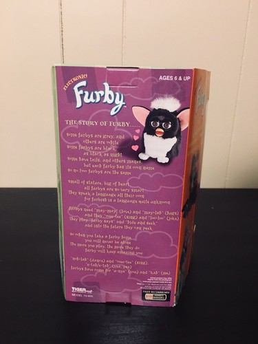 1998 TIGER ELECTRONICS--ELECTRONIC BLACK/WHITE RARE CLOSED EYES. NEW. SEALED