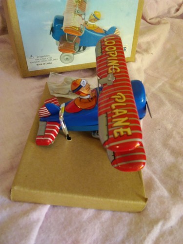 NRFB Tin Toy Reproduction Looping Plane Airplane With Pilot made by Ha Ha Toy