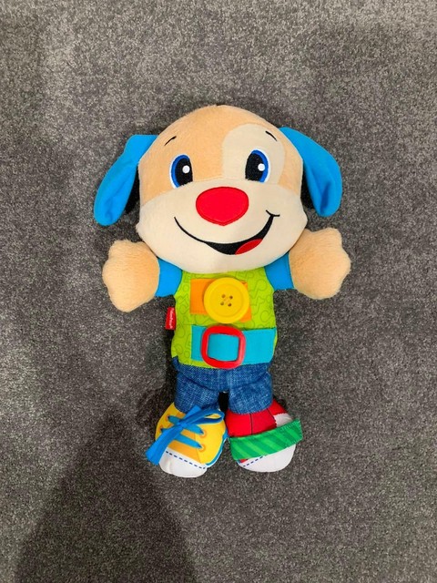 fisher price learn to dress doll