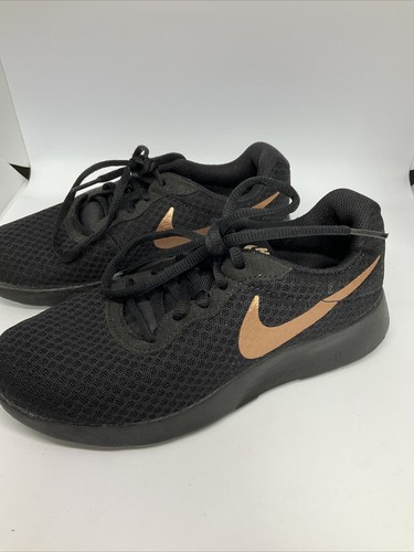 womens nike black and gold shoes