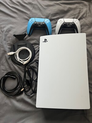 Ps5 console w/ 2 controllers & 6 ft charger.  Blu-Ray Disc Player.