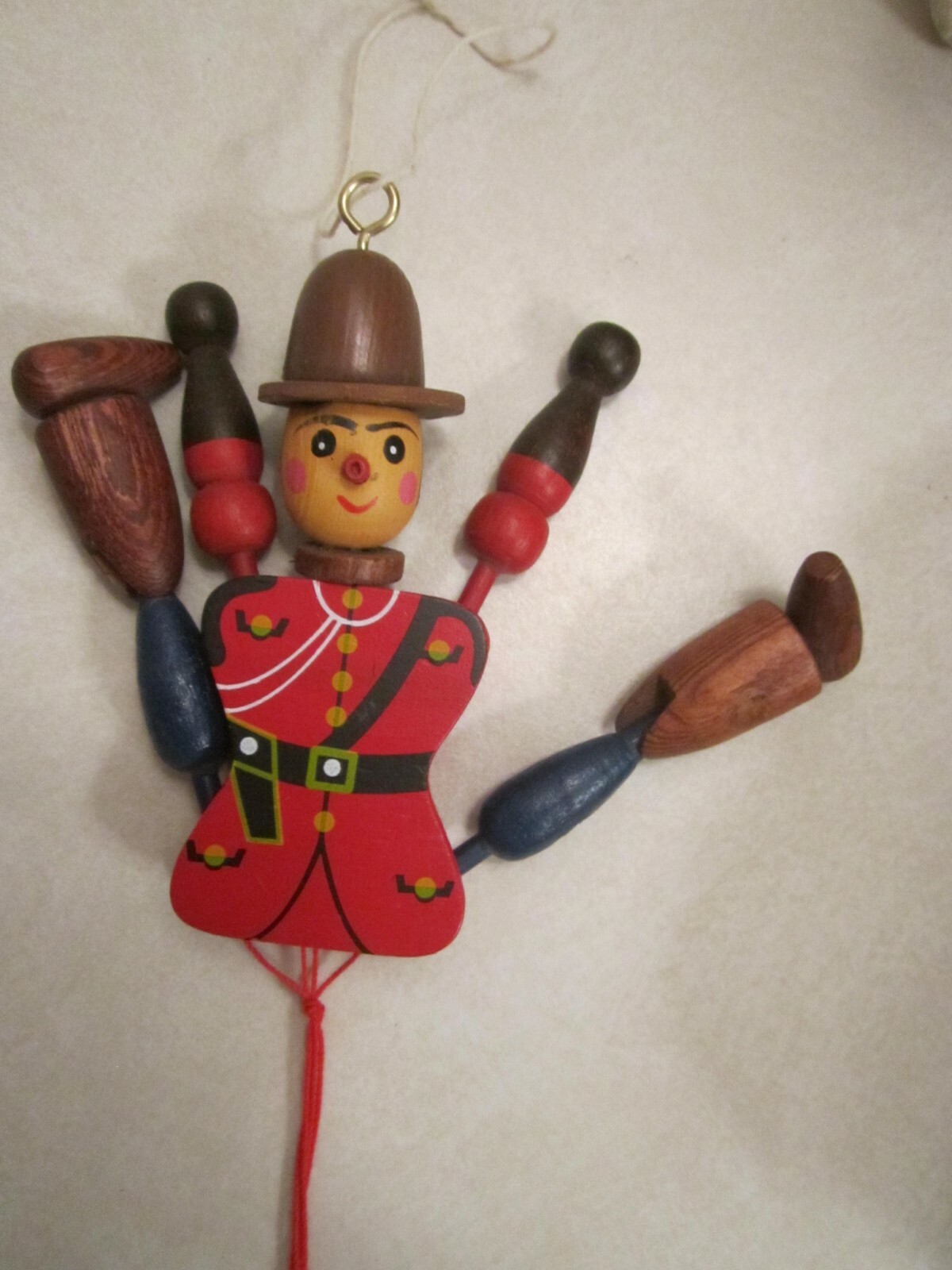 vintage wooden Canadian Mounty jumping-jack (marionette) string puppet