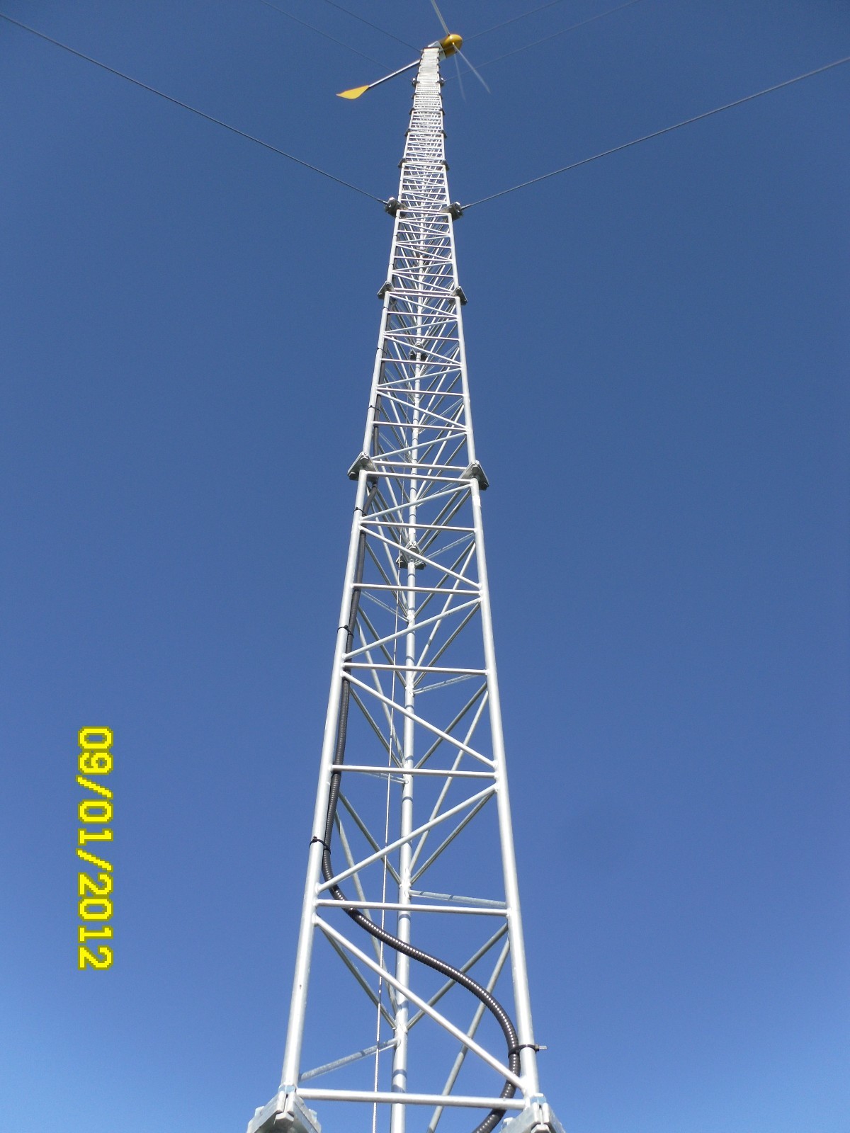 Bergey wind turbine 10k complete system with 140 ft guyed lattice tower.