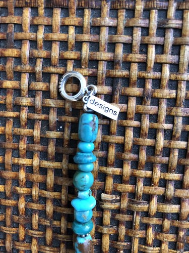 PAIGE WALLACE DESIGN TURQUOISE BRACELET. SEVERAL DIFFERENT STONES.
