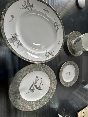 four 5 piece place settings of Wedgewood china, Hummingbird pattern, never used.