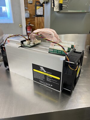 DragonMint T1 16 TH/s ASIC miner with PSU. New, unused equipment.