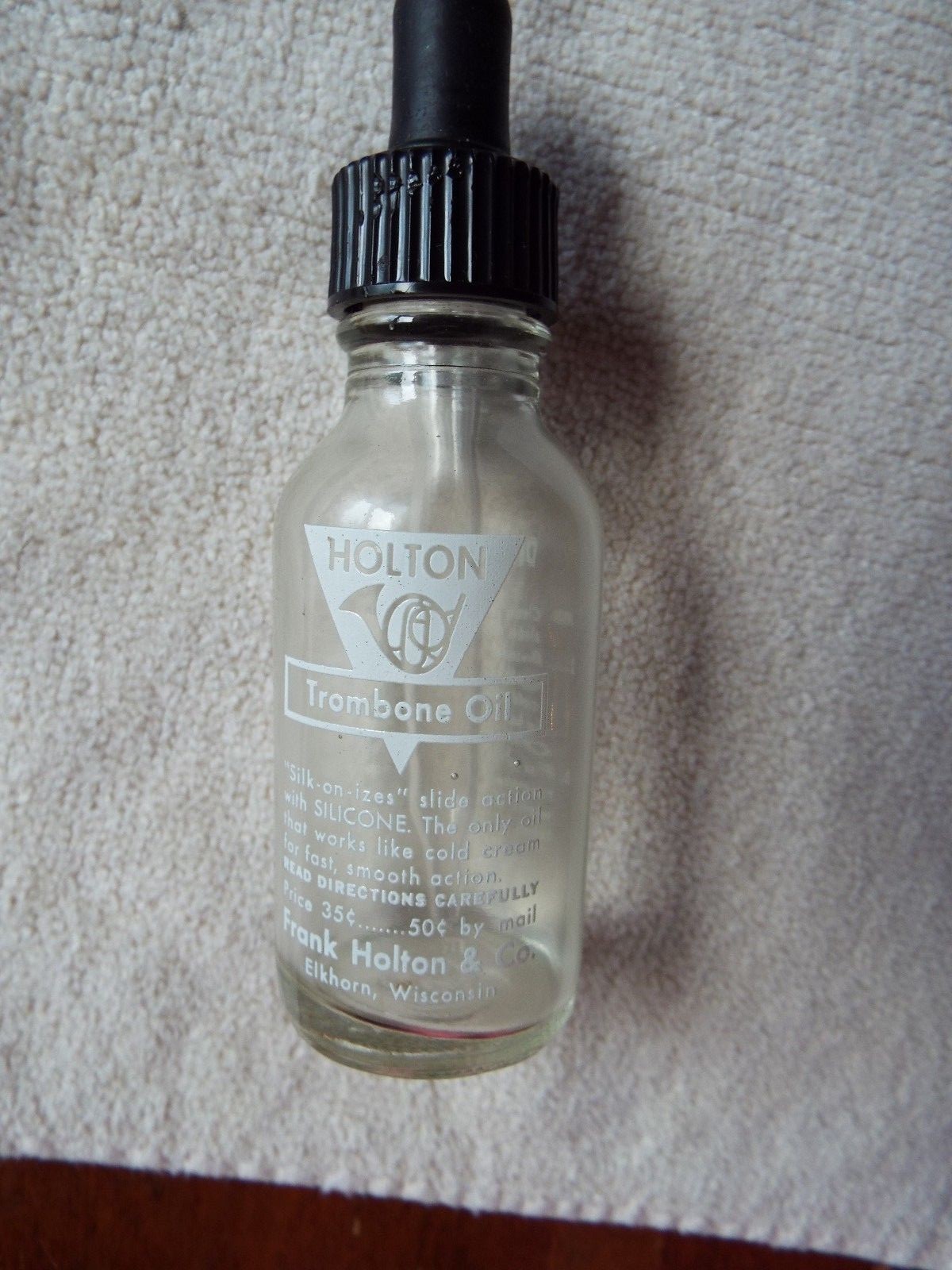 HOLTON TROMBONE OIL BOTTLE   with glass eye dropper