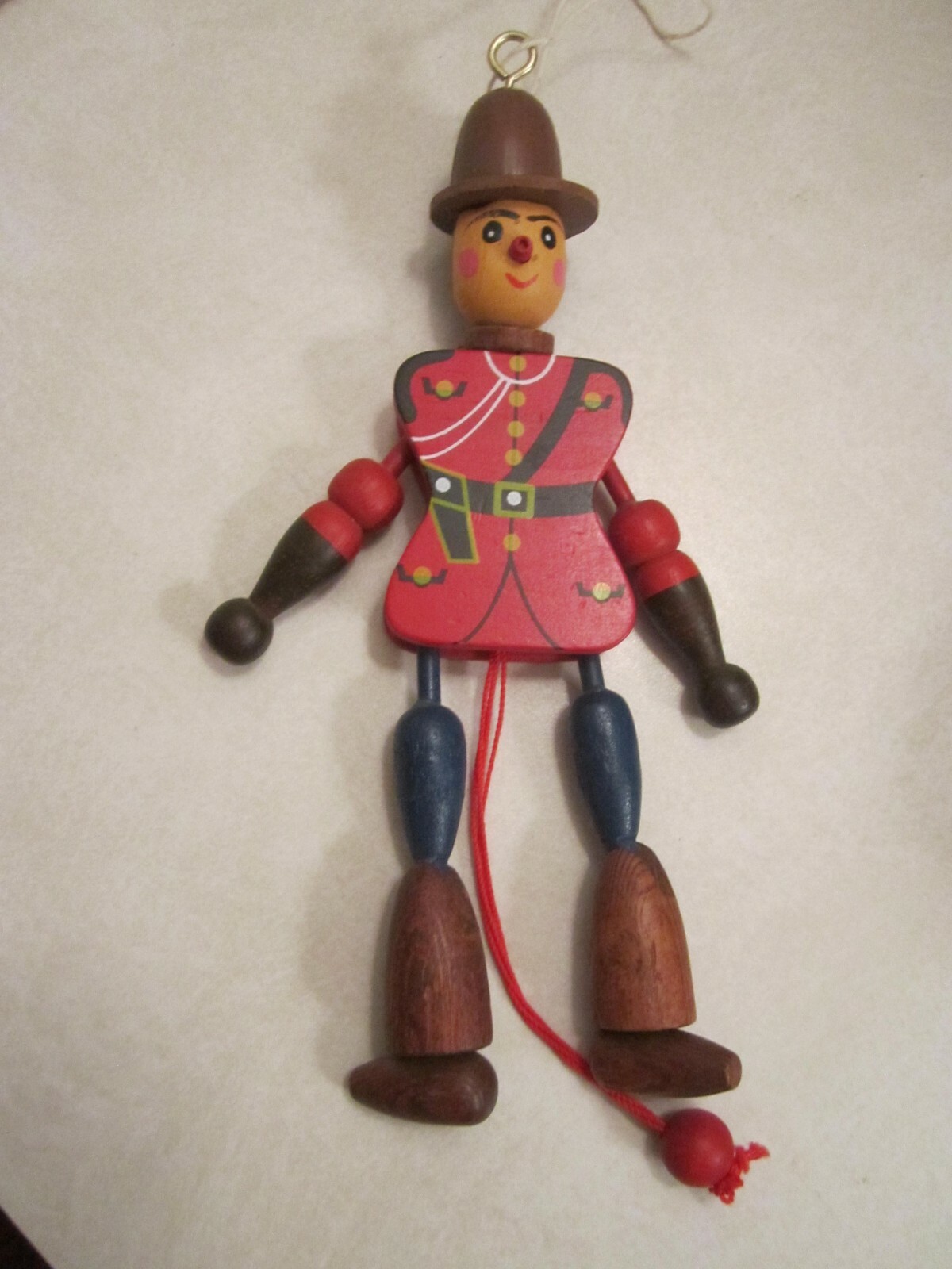 vintage wooden Canadian Mounty jumping-jack (marionette) string puppet