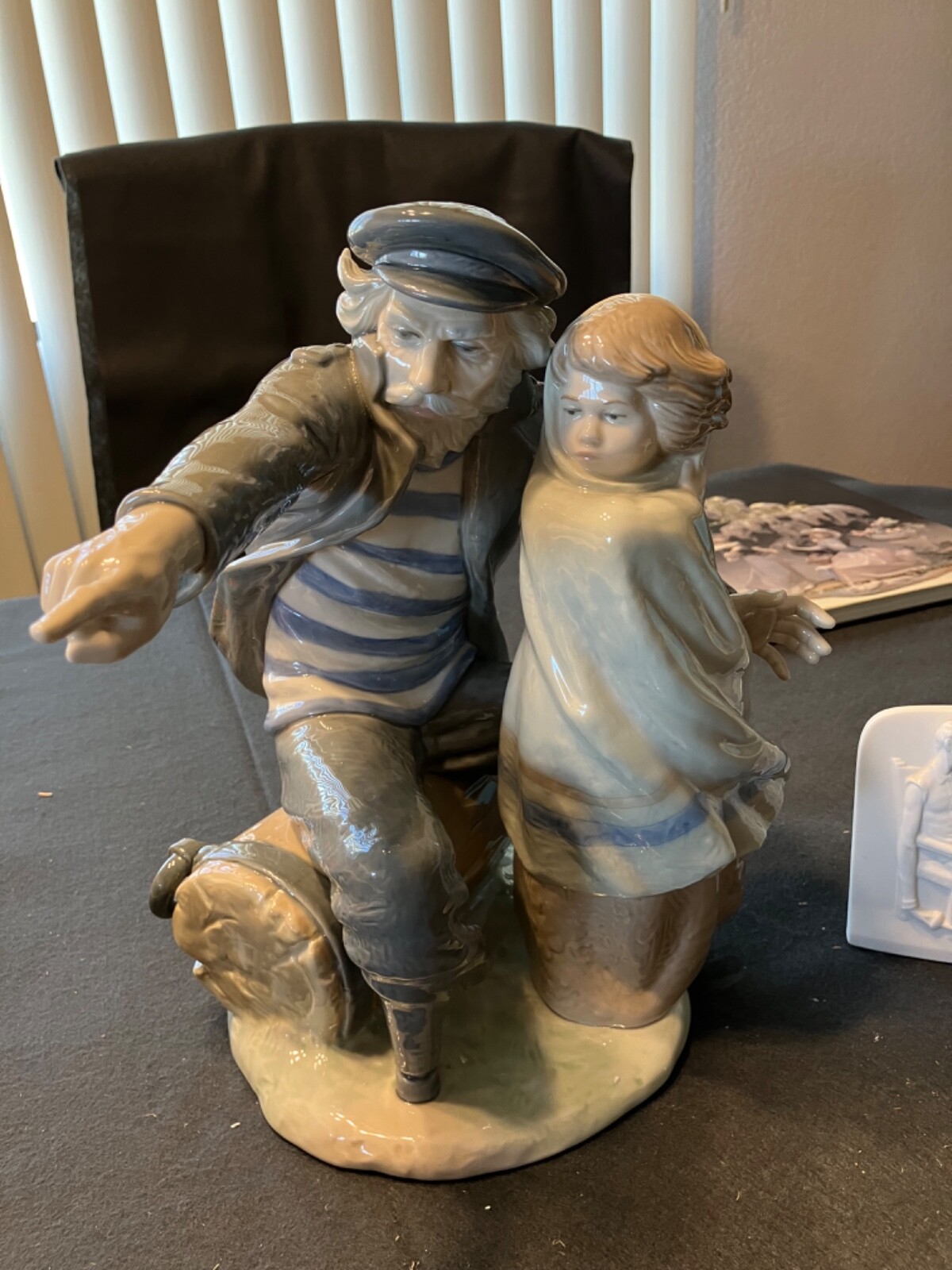 Lladro Retired Nao “Waiting for the Fisherman” #699 w/glazed