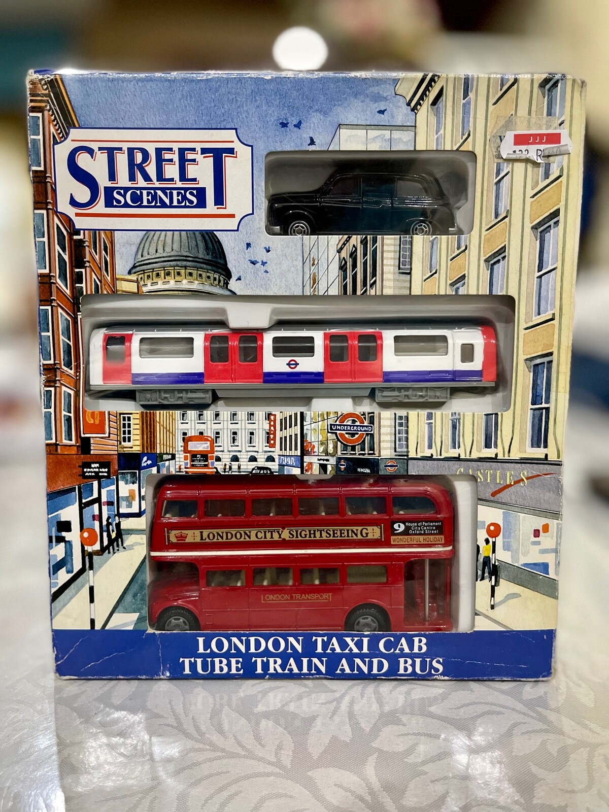 FEVA Street Scenes London Taxi Cab Tube Train and Bus J80140