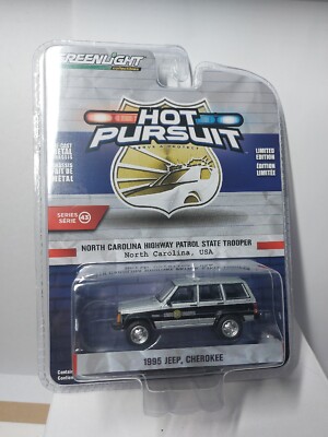 Greenlight 2/64 🇨🇵 Hot Pursuit 1995 Jeep Cherokee, NORTH CAROLINA usa#serie 43