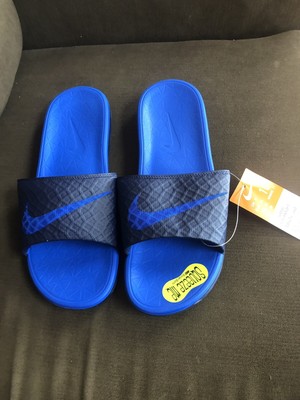 nike slides with smiley face