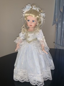 porcelain doll cabinet