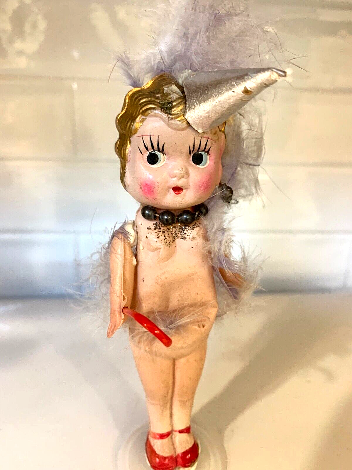 Sweet Faced Celluloid Kewpie Flapper Doll w Gold Hair Feathers Pointed Hat, Cane