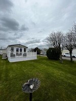 Cheap Static Caravan, Europa Sequoia. Huge wrap around deck. North Wales, Towyn