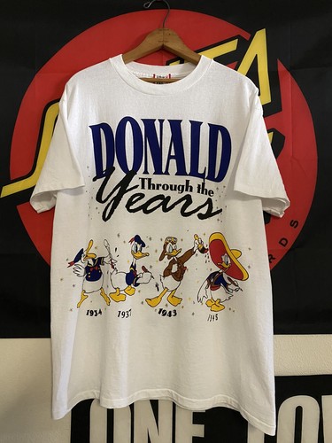 Vintage 90s Disney Donald Duck Through the Years Cartoon AOP Vintage 90s Disney Donald Duck Through the Years Cartoon AOP