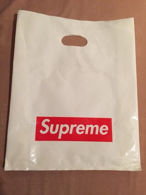 white a in red box logo