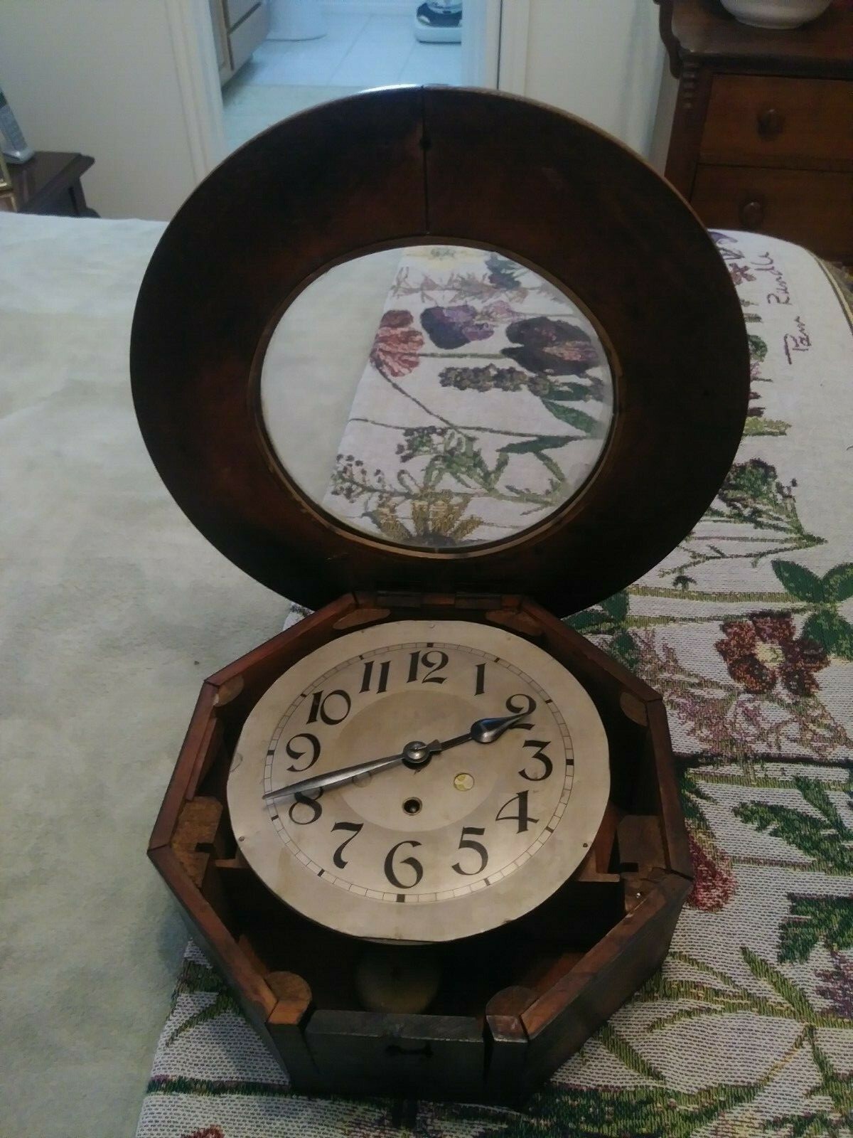 Antique round face Oak Wall Clock. Octagon case. Marked 1942