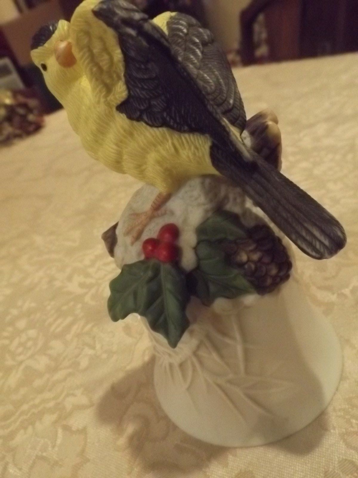 Decorative Bisque Porcelin Oriole with holly Bell