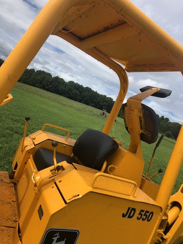 John Deere 555 crawler loader backhoe