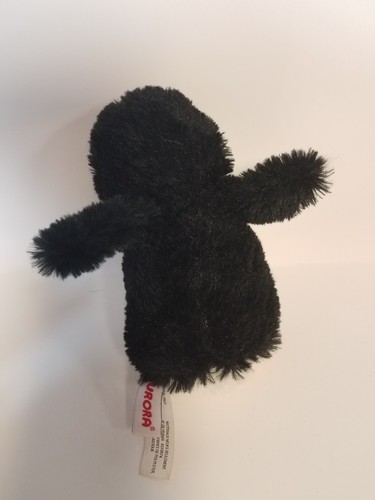 2 Plush Penguins black and white, big penguin vibrates Aurora stuffed animal