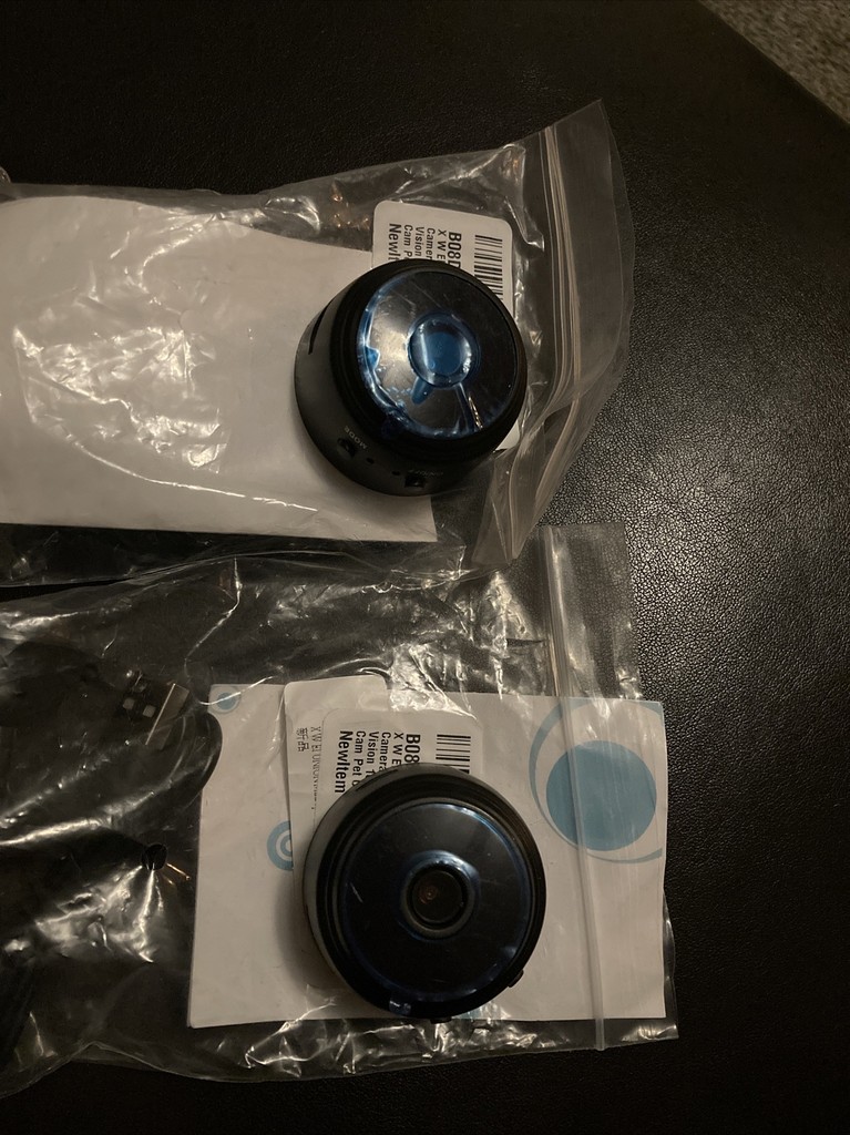 Two oil filters in sealed plastic bags.