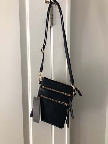 Isabelle Navy Cross Body  Purse Several Zippered Compartments MSRP 59.99