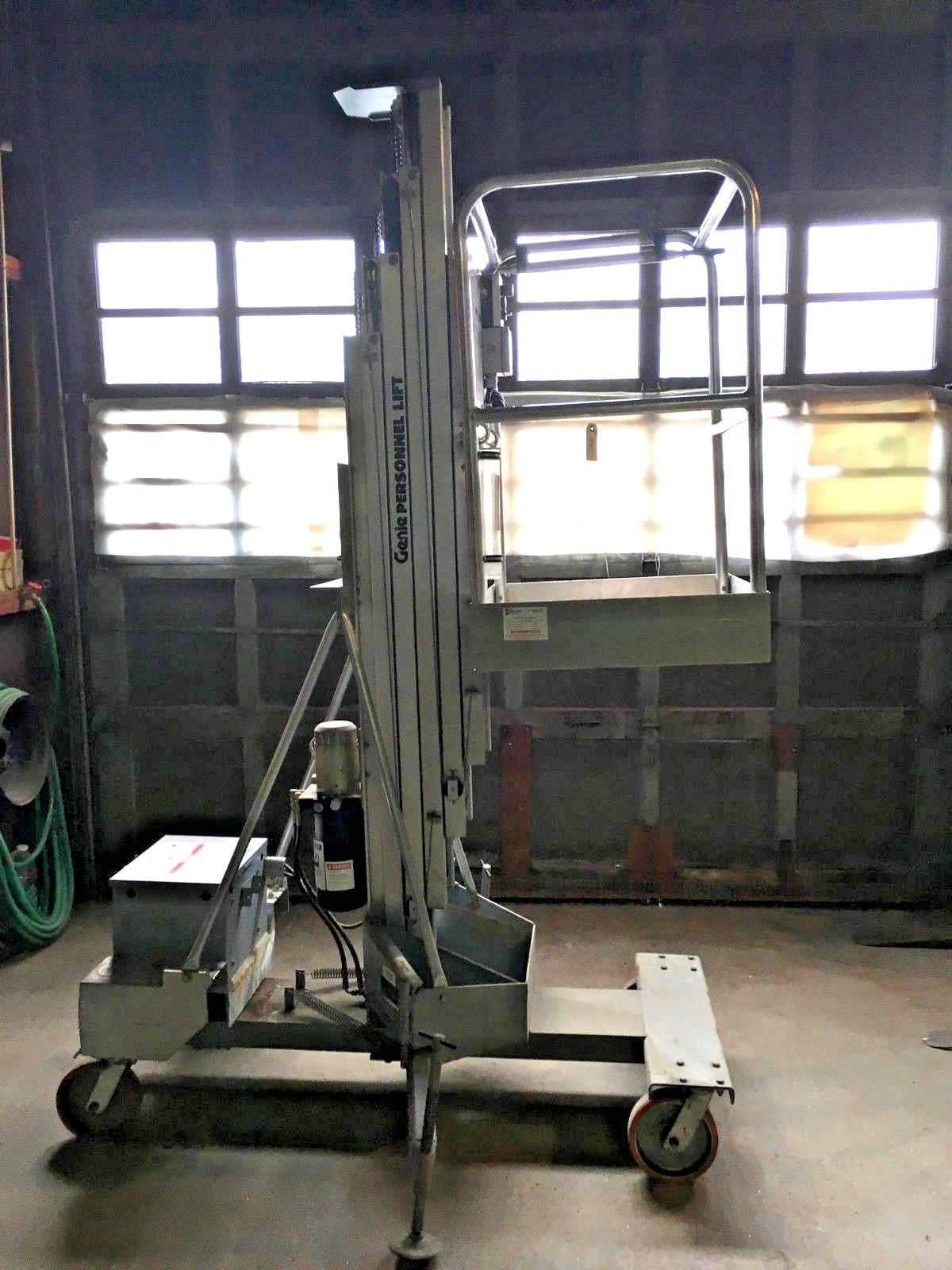 GENIE VERTICAL MAN LIFT