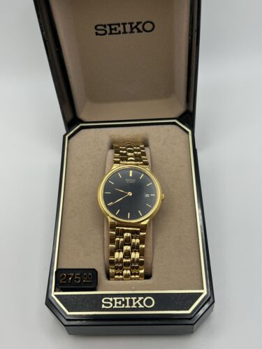Vintage Seiko quartz. Black and gold. 5Y39-7240. Gents, all Vintage Seiko quartz. Black and gold. 5Y39-7240. Gents, all