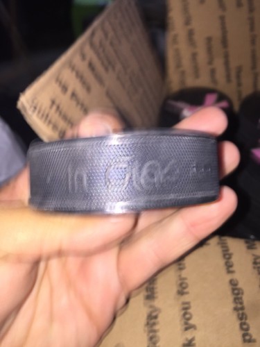 Hockey East  Hockey Pucks New  Lot Of 34  In glas  Official  Pink