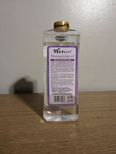 Veet gold collagen face and body corrector oil