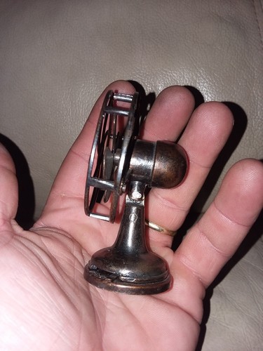 1977 MINI BRONZE FAN PAPERWEIGHT OR SALESMEN SAMPLE