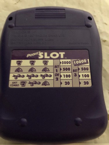 Electronic Slots Handheld Game 1997 Purple Slot Machine RADICA Pocket