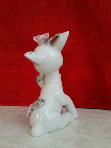 Rare Vintage White porcelain Reindeer With Pink Flower And Gold Hooves Figurine