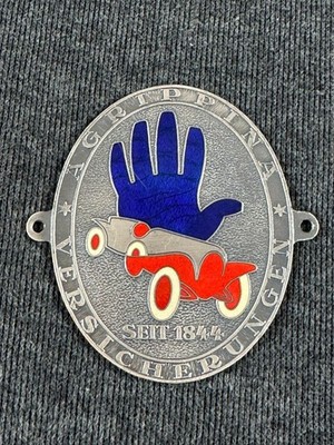 Agrippina Versicherung Insurance German Enamel Car Badge Emblem Insignia