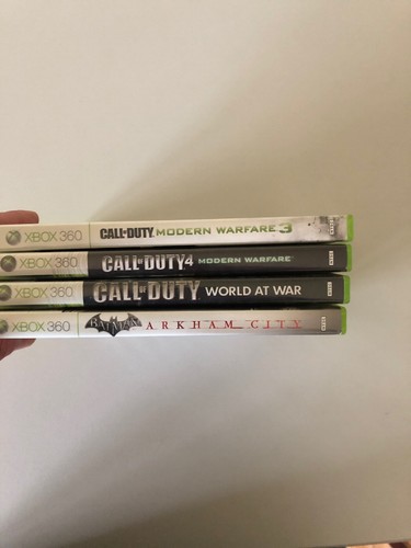 Lot of 4 Xbox 360 Games Call of Duty 4 Modern Warfare MW3 World At War Batman