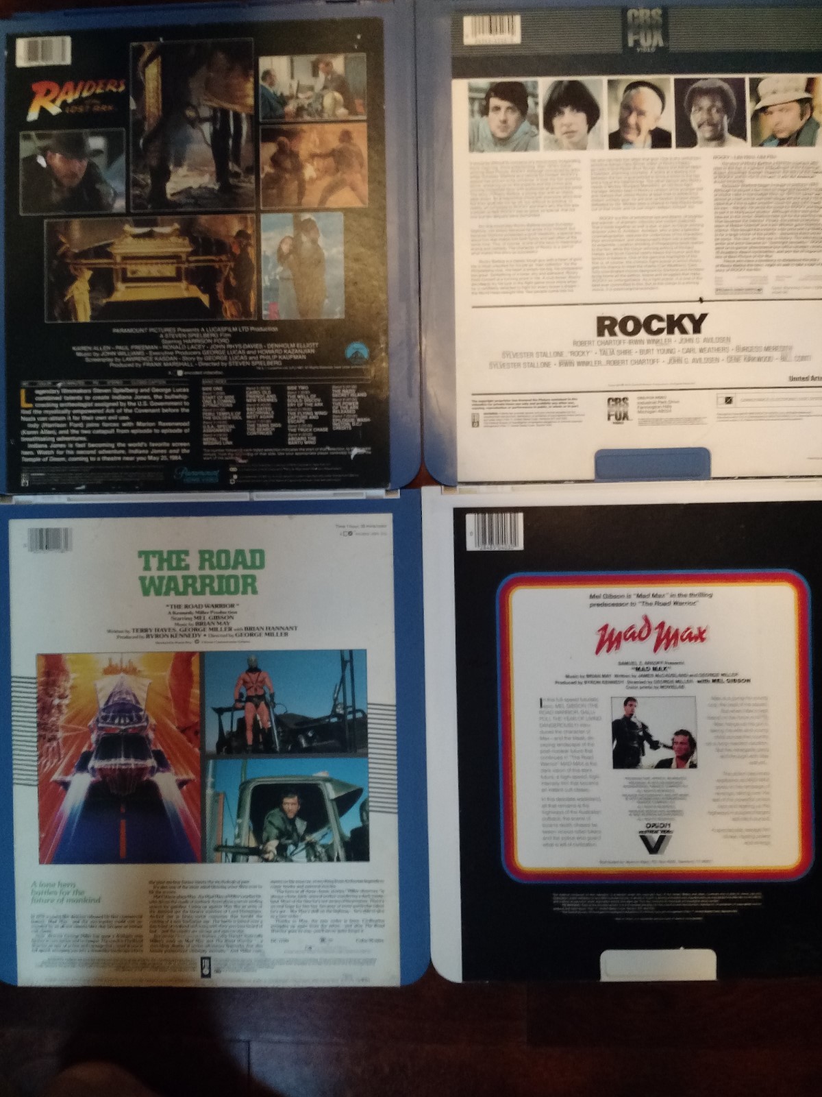 4 LOT CED VIDEODISC  ROCKY, MAD MAX, & THE ROAD WARRIOR, RAIDERS OF THE LOST ARC